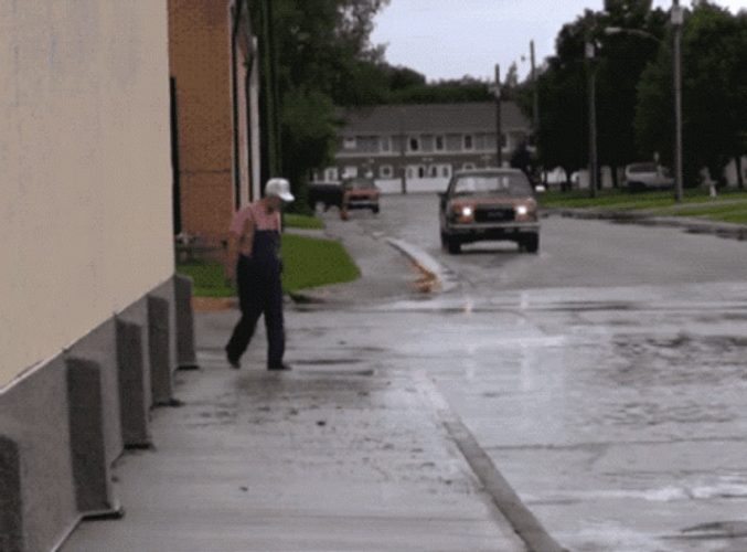 Hilarious Man Car Water Splash GIF