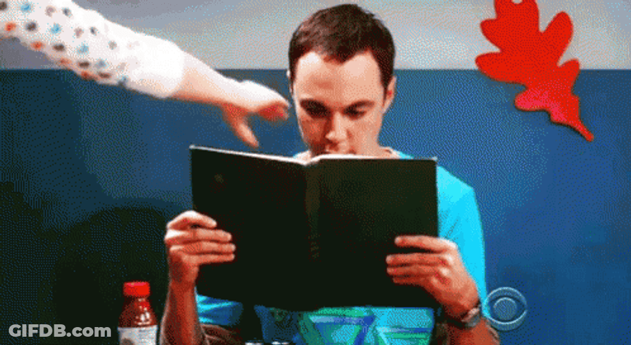 Hilarious Sheldon Reading Pretending To Work GIF