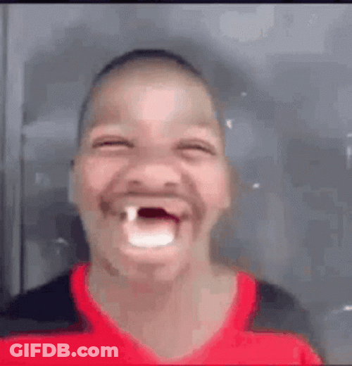 Hilariously Laughing Toothless Guy GIF
