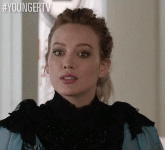 Hilary Duff Sipping From Cup GIF