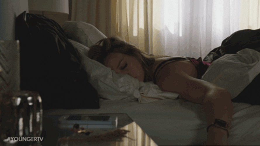 Hilary Duff Turns Off Alarm GIF