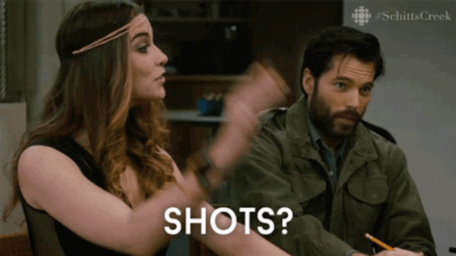 Hippy Annie Murphy Queuing For Shots GIF