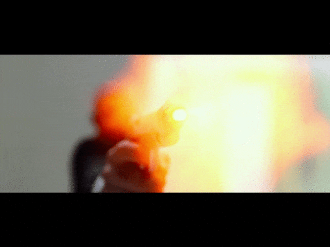 Hitman Firing His Gun GIF