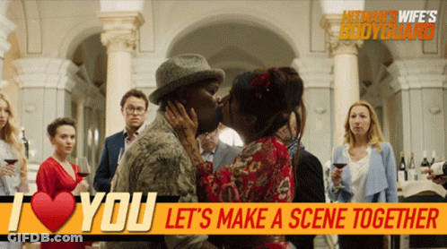 Hitman's Wife's Bodyguard Poster Couple Kissing GIF