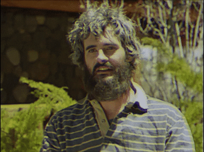 Hobo Using Polaroid Camera GIF