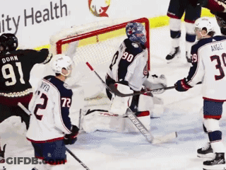 Hockey Game In Front Of Ability Health Sign GIF