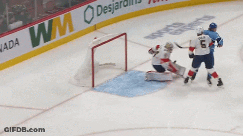 Hockey Game In Front Of Air Canada Banner GIF