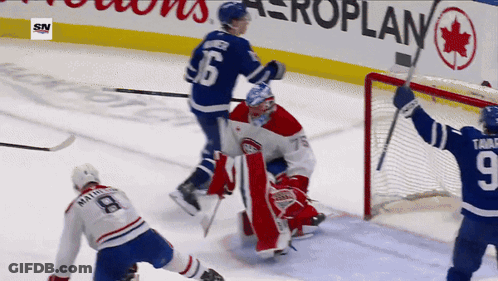 Hockey Game In Front Of Airplane Banner GIF