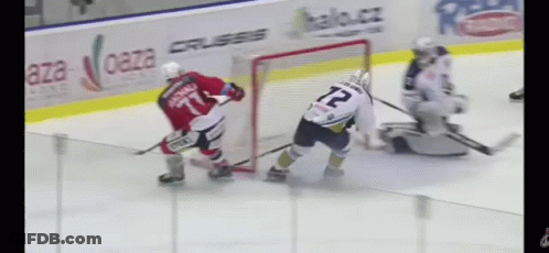 Hockey Game In Front Of Aza Banner GIF