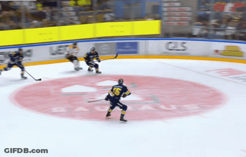 Hockey Game In Front Of Bauhaus Sign GIF