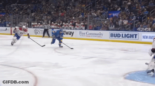 Hockey Game In Front Of Bud Light Ad GIF