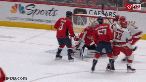 Hockey Game In Front Of Caesars Ad GIF