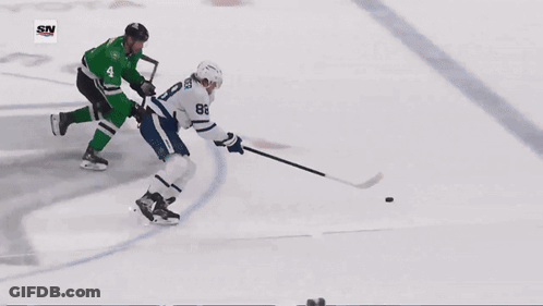 Hockey Game In Front Of Children's Hospital Banner GIF