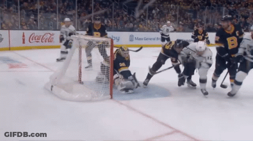 Hockey Game In Front Of Coca-Cola Advertisement GIF