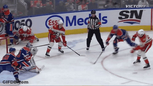 Hockey Game In Front Of Cox Ad GIF