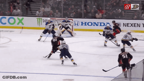 Hockey Game In Front Of Cox Ad GIF