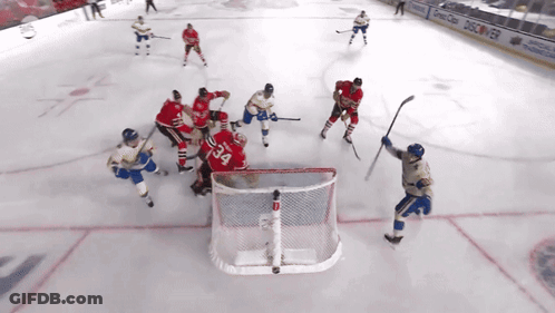 Hockey Game In Front Of Discovery Banner GIF