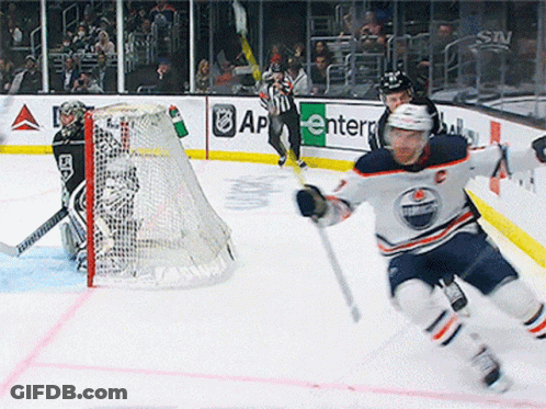 Hockey Game In Front Of Enter Sign GIF