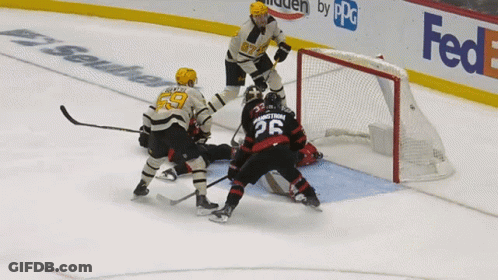 Hockey Game In Front Of FedEx Banner GIF