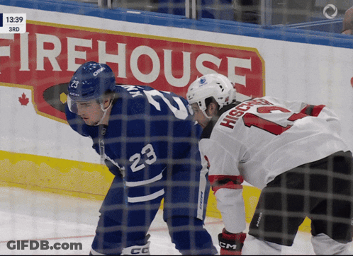 Hockey Game In Front Of Firehouse Ad GIF