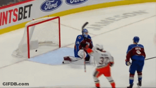 Hockey Game In Front Of Ford Ad GIF