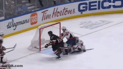 Hockey Game In Front Of Geico And Tim Hortons GIF