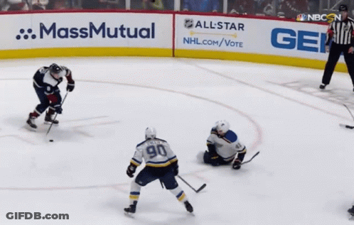 Hockey Game In Front Of Geico Sign GIF