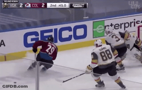 Hockey Game In Front Of Geico Sign GIF