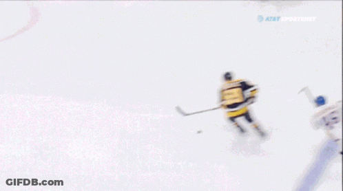 Hockey Game In Front Of Geico Sign GIF