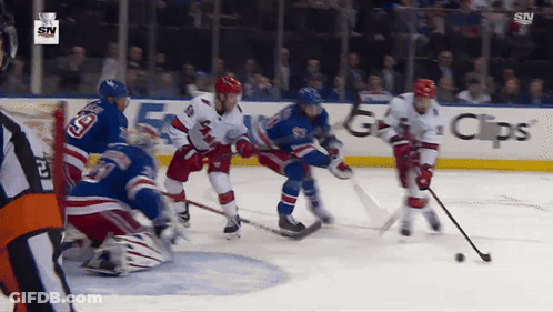 Hockey Game In Front Of GPS Ad GIF