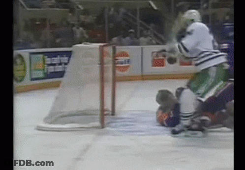 Hockey Game In Front Of Gulf Sign GIF