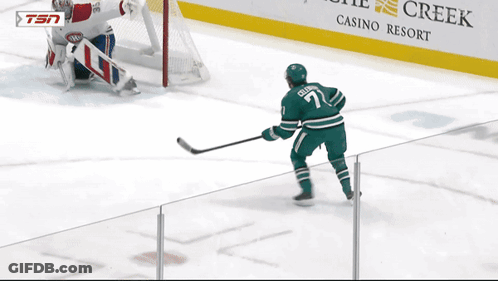Hockey Game In Front Of Habbas Law Ad GIF