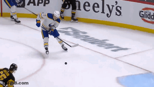 Hockey Game In Front Of Heely's Sign GIF