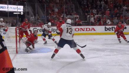 Hockey Game In Front Of Honda Advertisement GIF