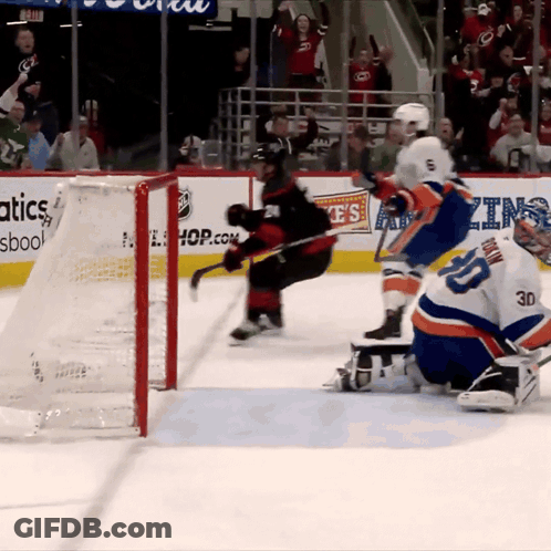 Hockey Game In Front Of Hop.com Banner GIF