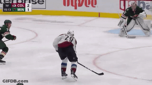 Hockey Game In Front Of Hyvee Banner GIF
