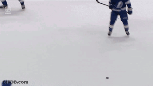 Hockey Game In Front Of Imaging Sign GIF
