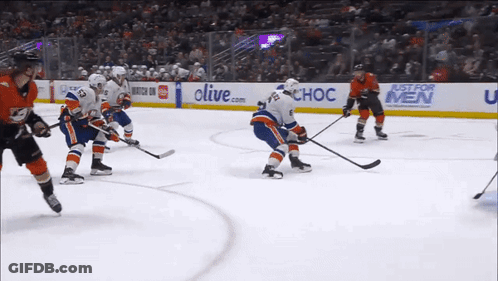 Hockey Game In Front Of Just For Men Sign GIF
