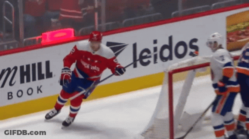 Hockey Game In Front Of Leidos Ad GIF