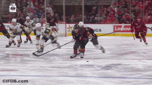 Hockey Game In Front Of Lenovo Advertisement GIF