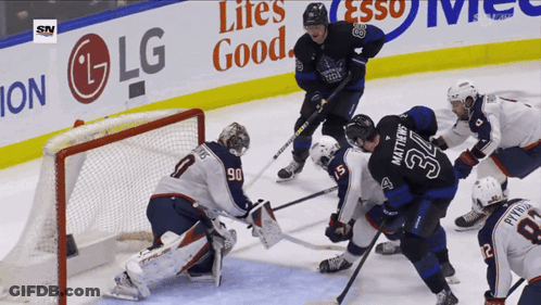Hockey Game In Front Of LG Banner GIF