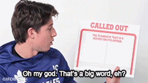 Hockey Game In Front Of Little Caesars Ad GIF