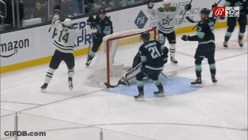 Hockey Game In Front Of Mazon Banner GIF