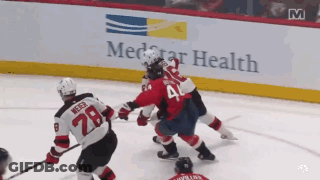 Hockey Game In Front Of MedStar Health Ad GIF