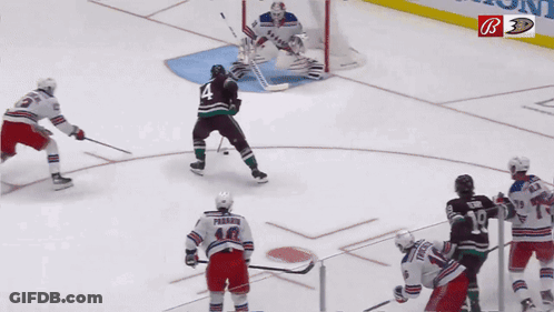 Hockey Game In Front Of Park West Sign GIF