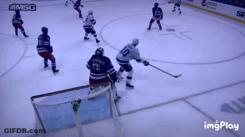 Hockey Game In Front Of Pepsi Ad GIF