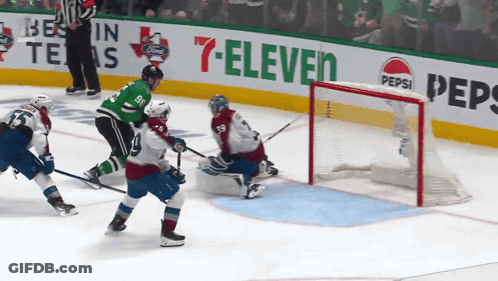 Hockey Game In Front Of Pepsi Advertisement GIF