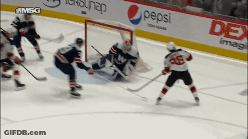 Hockey Game In Front Of Pepsi Sign GIF