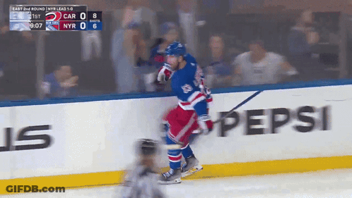 Hockey Game In Front Of Pepsi Sign GIF