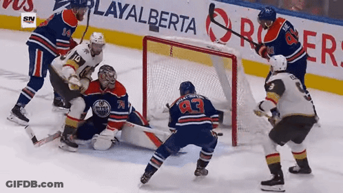 Hockey Game In Front Of PlayAlberta Banner GIF